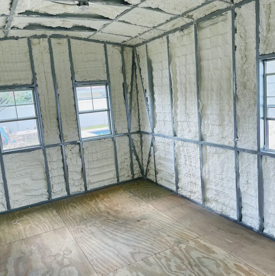 Closed-cell spray foam insulation applied to wall cavities in a residential project in Palmetto Estates